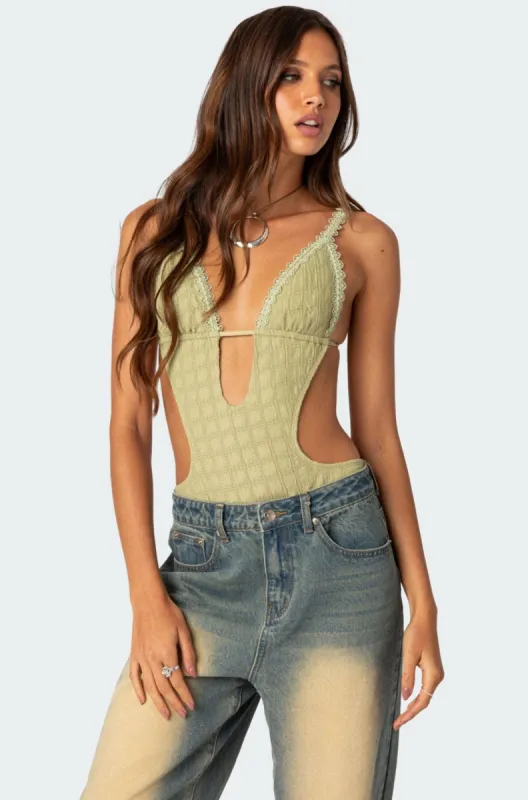 Textured Cut Out Bodysuit sold by Edikted