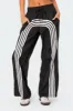 Wilda Striped Nylon Track Pants sold by Edikted