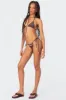 Puka Charm Triangle Bikini Top sold by Edikted