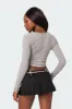 Yara Ribbed Ruffle Hem Top sold by Edikted