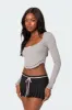 Yara Ribbed Ruffle Hem Top sold by Edikted