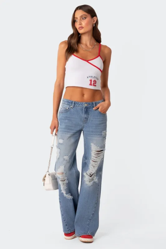 Low Rise Distressed Wide Leg Jeans sold by Edikted