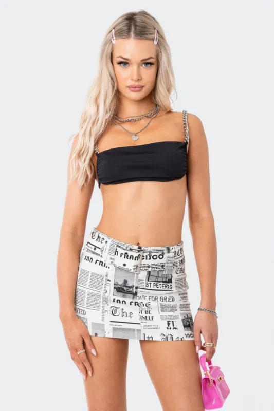 Raven Open-Back Chain Crop Top sold by Edikted