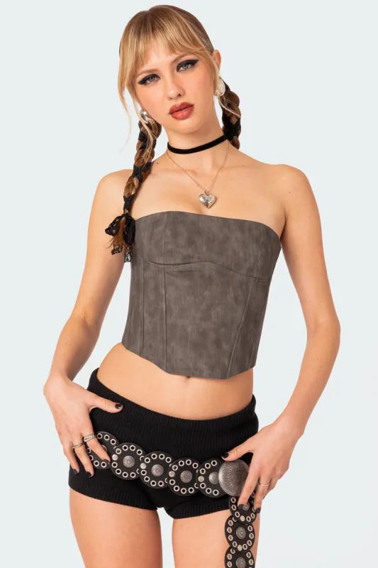 Christa Washed Faux Leather Corset sold by Edikted