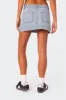 Foxx Denim Mini Skirt sold by Edikted