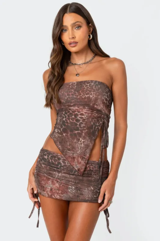 Leopard printed asymmetric mesh tube top sold by Edikted
