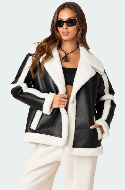 Rocki Oversized Faux Leather Shearling Jacket sold by Edikted