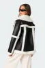 Rocki Oversized Faux Leather Shearling Jacket sold by Edikted