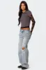 Adam Distressed Wide Leg Jeans sold by Edikted