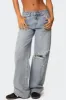 Adam Distressed Wide Leg Jeans sold by Edikted