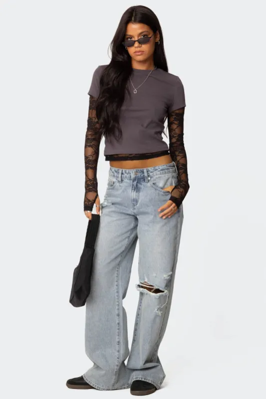 Adam Distressed Wide Leg Jeans sold by Edikted