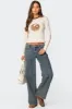 Leopard Heart Washed Jeans sold by Edikted