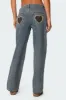 Leopard Heart Washed Jeans sold by Edikted