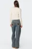 Leopard Heart Washed Jeans sold by Edikted