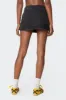 Asymmetric Denim Wrap Skort sold by Edikted