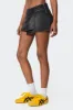 Asymmetric Denim Wrap Skort sold by Edikted