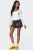 Asymmetric Denim Wrap Skort sold by Edikted