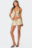 Rhona Pleated Mini Skort sold by Edikted