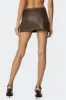 Crawford Faux Leather Micro Skort sold by Edikted