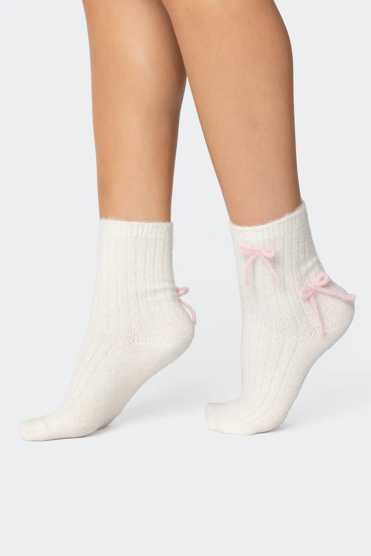 Knit Bow Fuzzy Socks sold by Edikted