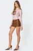 Studded Faux Leather Mini Skort sold by Edikted