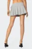 Tate Belted Pleated Mini Skirt sold by Edikted