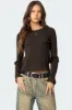 Distressed Ribbed Knit Sweater sold by Edikted