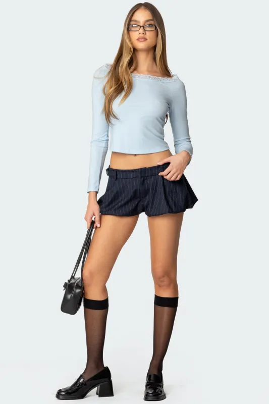 Buckled Pinstripe Bubble Mini Skort sold by Edikted