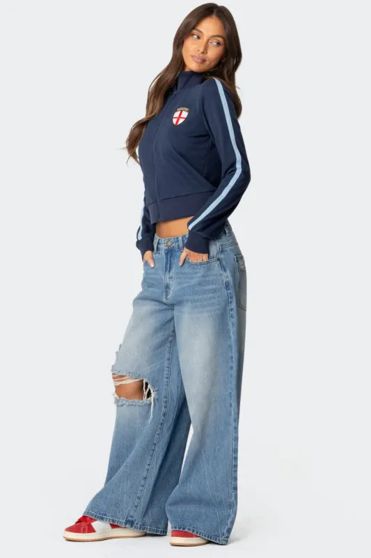 Distressed Low Rise Baggy Jeans sold by Edikted