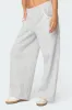 Ashtin Ruffle Trim Sweatpants sold by Edikted