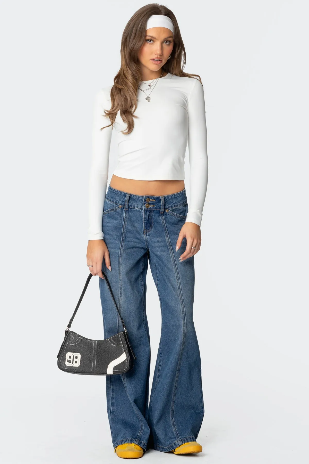 Charlie Panel Stitch Low Rise Bootcut Jeans sold by Edikted