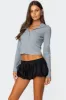 Hooded Henley Waffle Top sold by Edikted