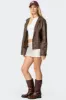 Bexley Bow Satin Effect Mini Skirt sold by Edikted