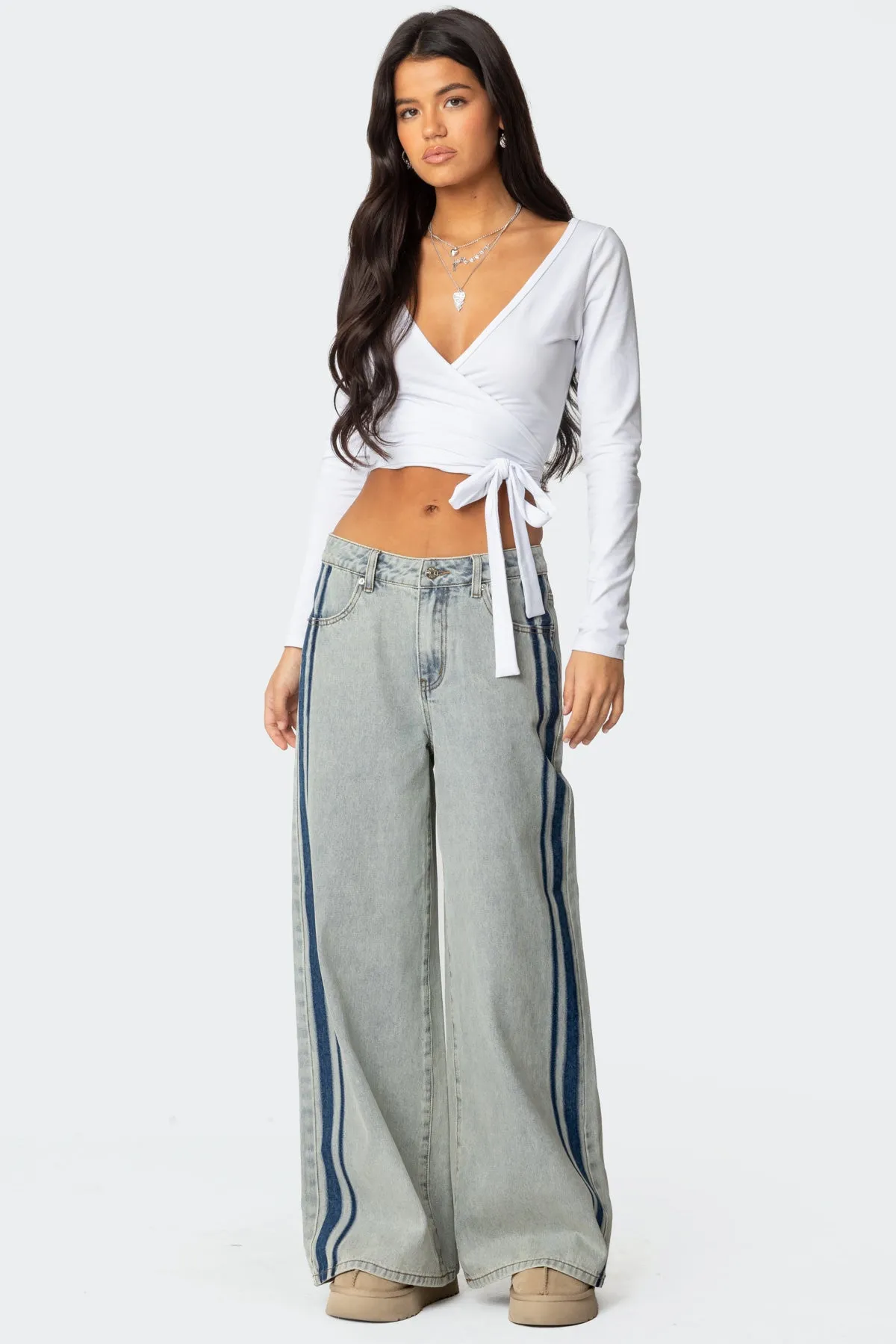 Side Stripe Washed Low Rise Baggy Jeans sold by Edikted