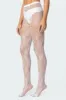 Lacey Fishnet Tights sold by Edikted