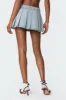 Elyssa Pleated Denim Mini Skort sold by Edikted