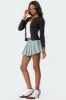 Elyssa Pleated Denim Mini Skort sold by Edikted