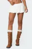Livvie Eyelet Bubble Mini Skirt sold by Edikted