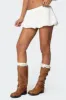 Livvie Eyelet Bubble Mini Skirt sold by Edikted