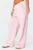 Ashtin Ruffle Trim Sweatpants sold by Edikted