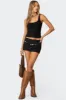 Peni Mini Skort sold by Edikted