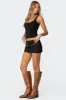 Peni Mini Skort sold by Edikted