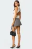 Stud Pleated Denim Mini Skirt sold by Edikted