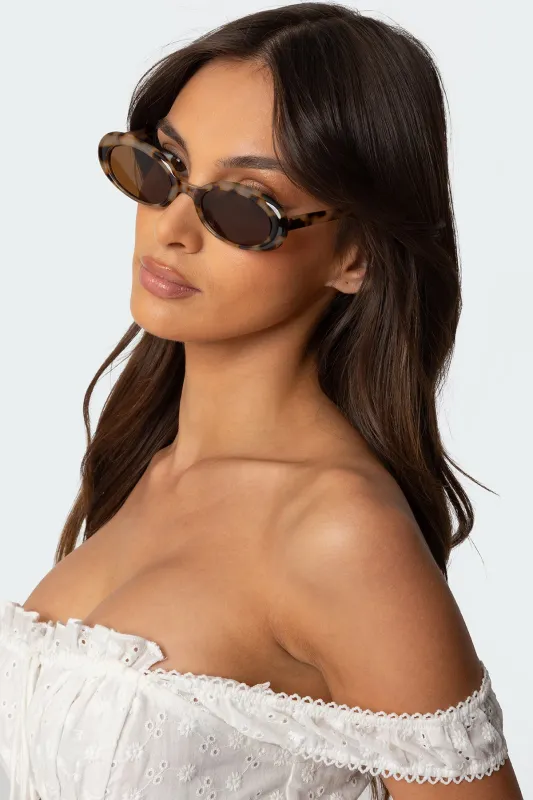 Mani Oval Sunglasses sold by Edikted