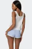 Fiore Eyelet Tie Front Top sold by Edikted
