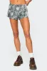 Nikki Nylon Shorts sold by Edikted