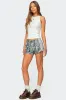 Nikki Nylon Shorts sold by Edikted