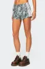 Nikki Nylon Shorts sold by Edikted