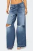 Xenia Distressed Low Rise Jeans sold by Edikted
