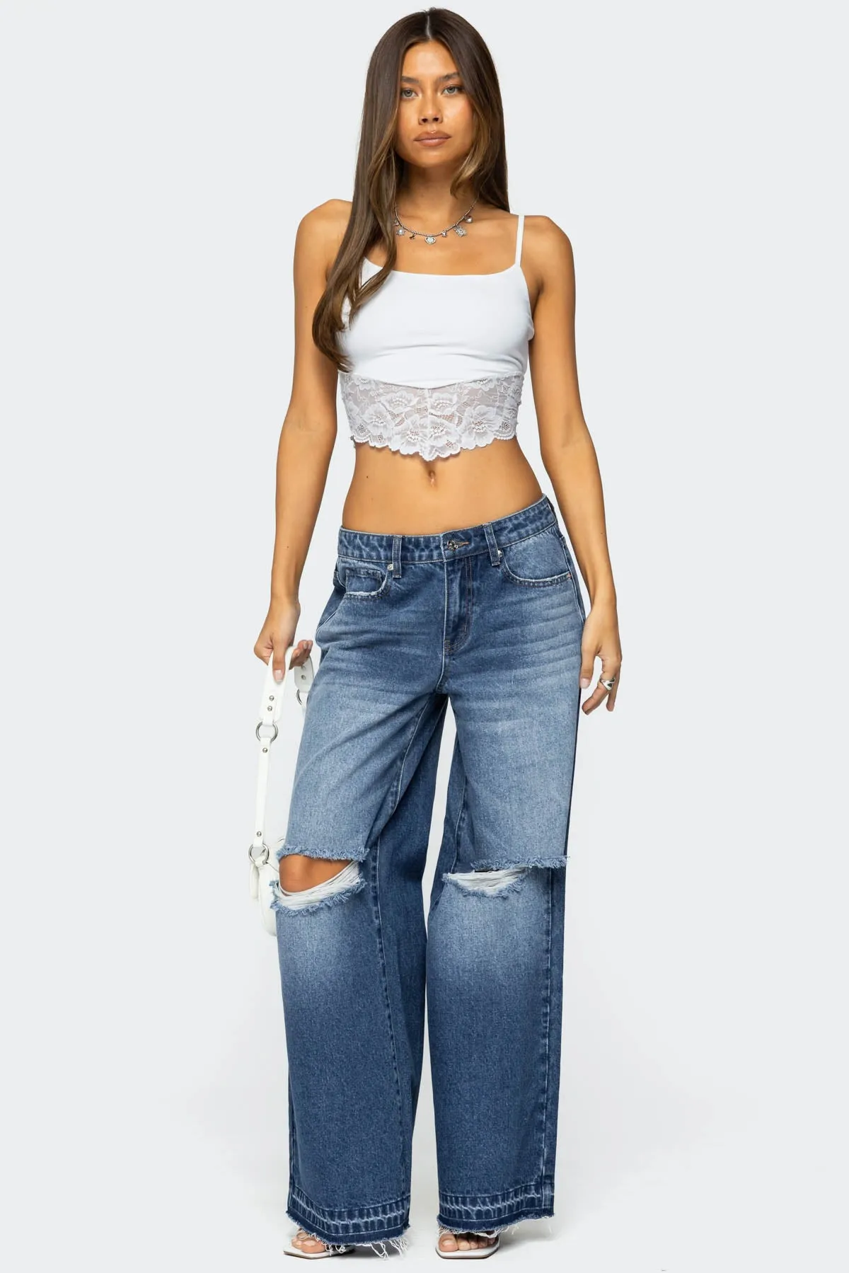 Xenia Distressed Low Rise Baggy Jeans sold by Edikted